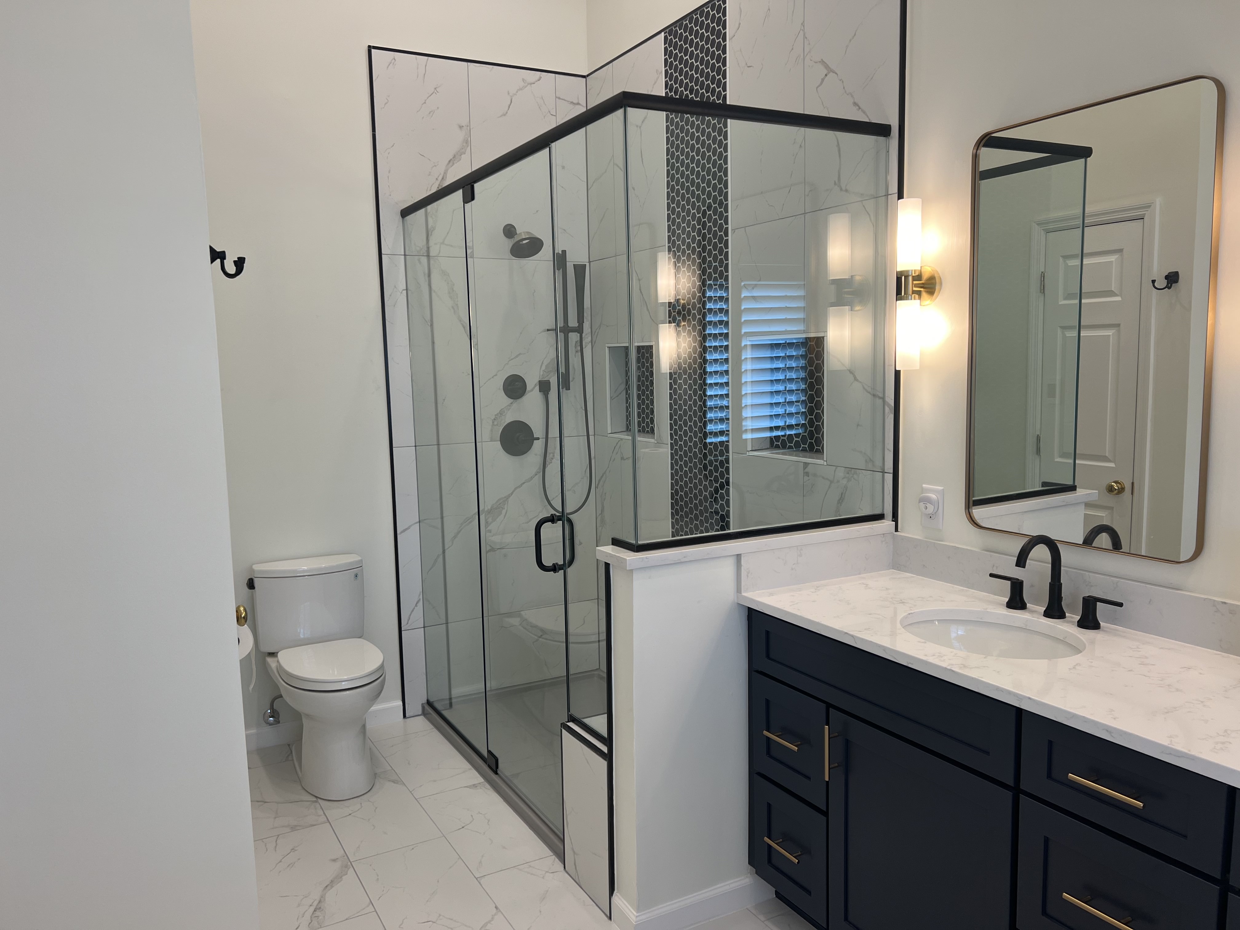 Finished bathroom remodeled by KM Contracting